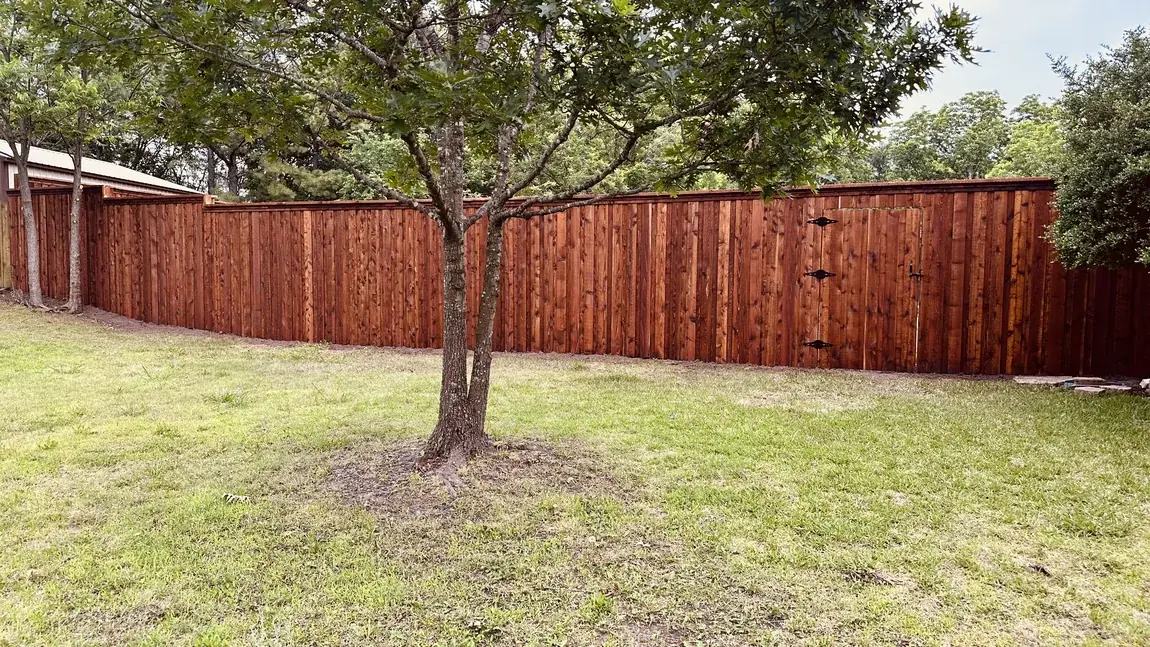 Cedar fence around a backyard by Aesthetic Gates & Fence in Navarro County, Texas