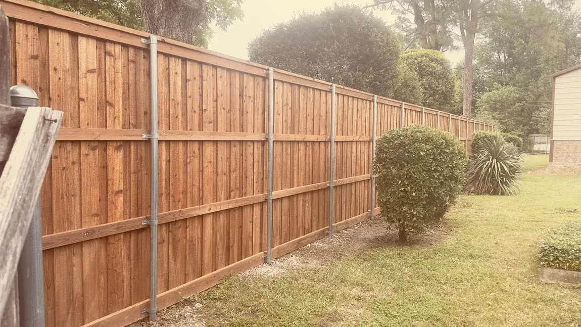 Cedar fence on a residential lot by Aesthetic Gates & Fence in Navarro County, Texas