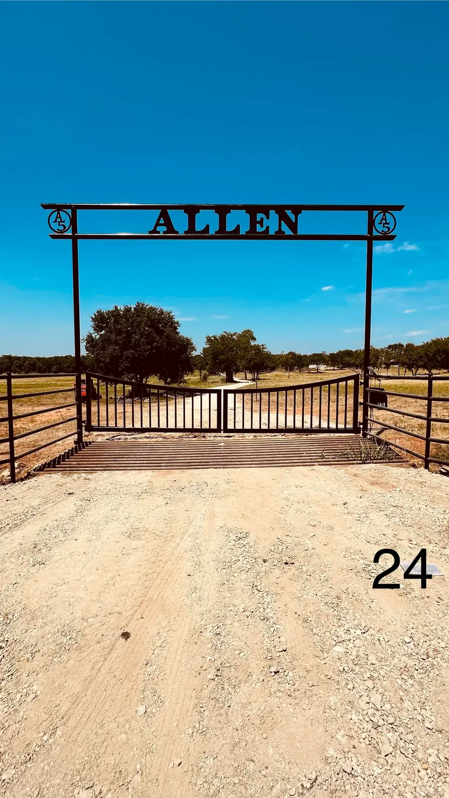 Custom ranch entrance with a cut-steel name sign in Corsicana, Texas