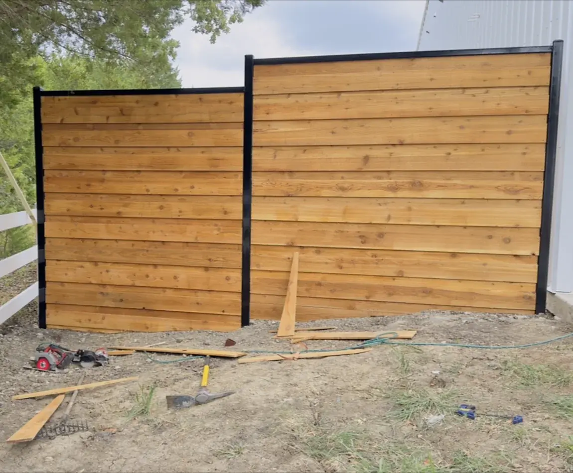 Horizontal cedar in a steel frame by Aesthetic Gates & Fence in Navarro County, Texas