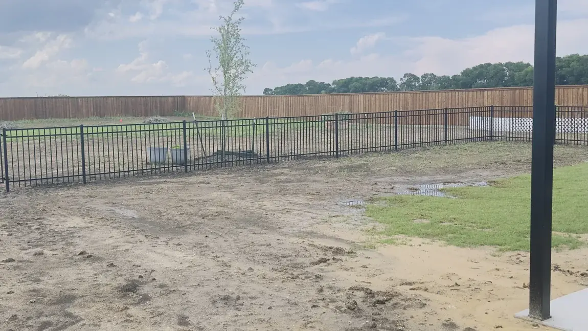 Iron fence to the corner post by Aesthetic Gates & Fence in Navarro County, Texas