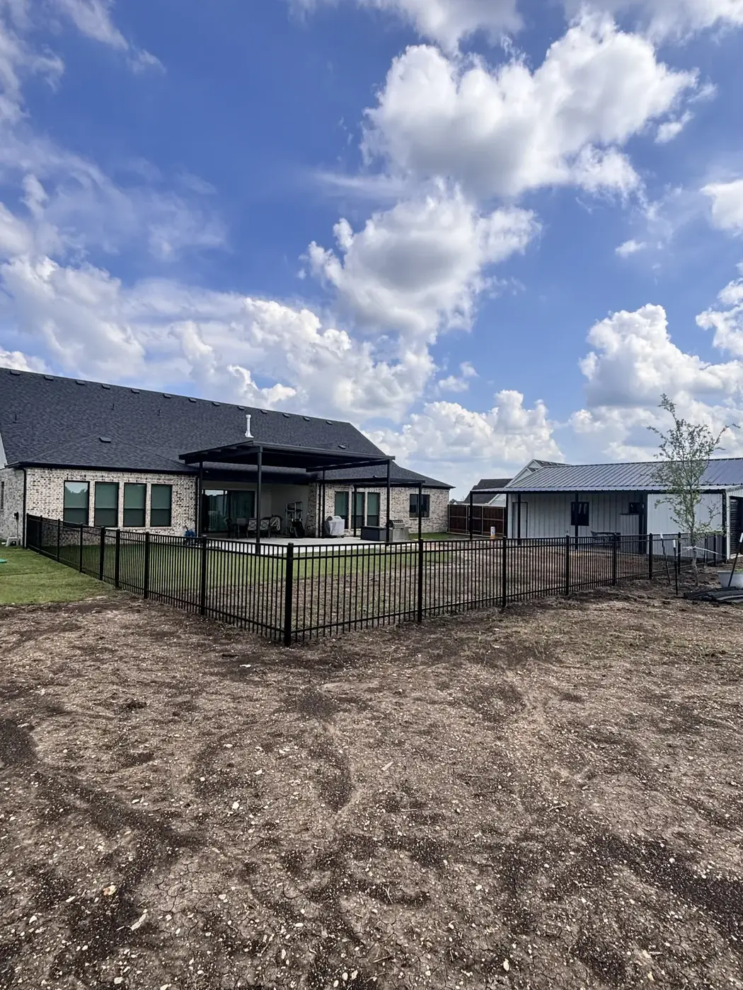 Iron fence at new construction by Aesthetic Gates & Fence in Navarro County, Texas