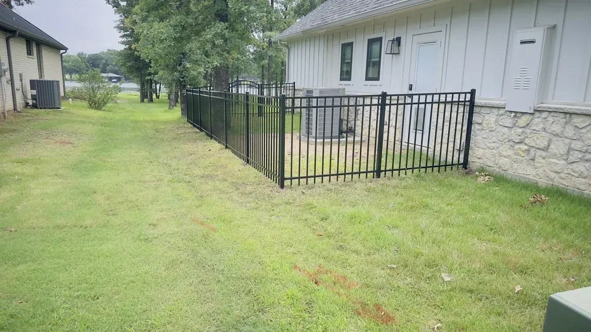 Iron fence around a residence by Aesthetic Gates & Fence in Navarro County, Texas