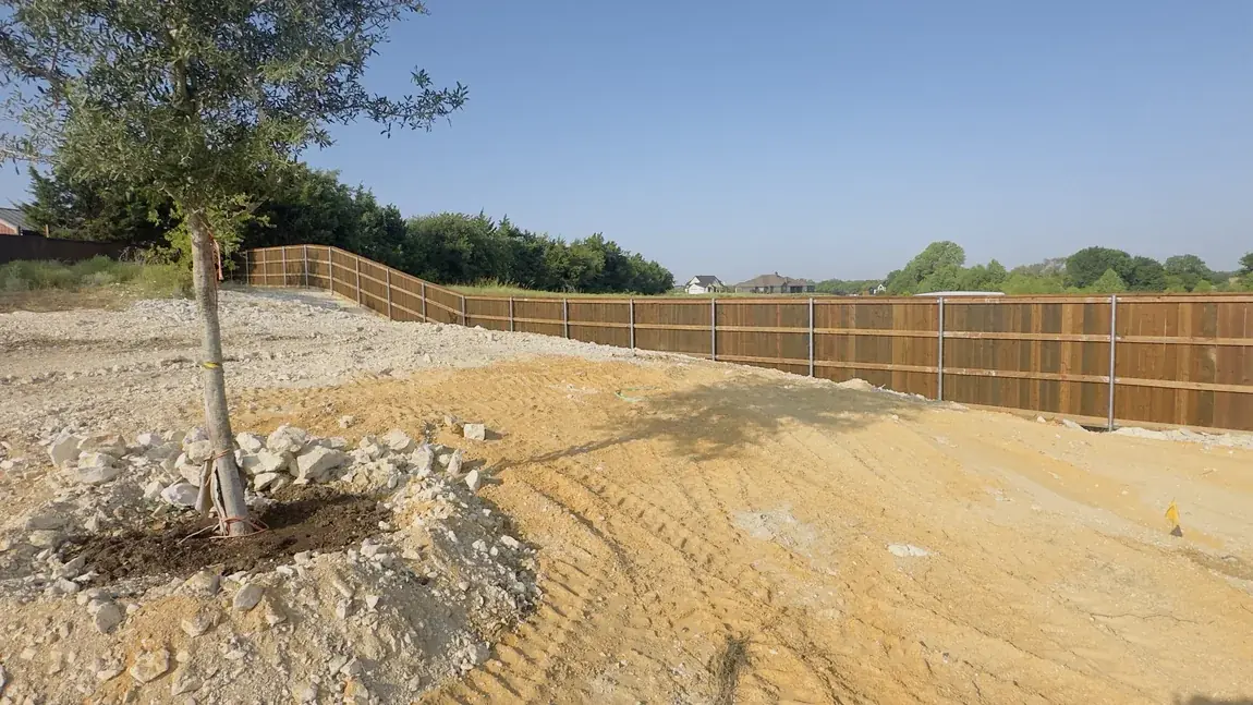 New wood fence, fresh install by Aesthetic Gates & Fence in Navarro County, Texas