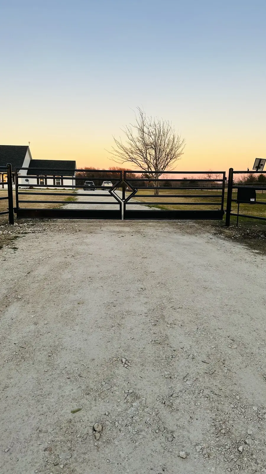 Pipe fence down the drive by Aesthetic Gates & Fence in Navarro County, Texas