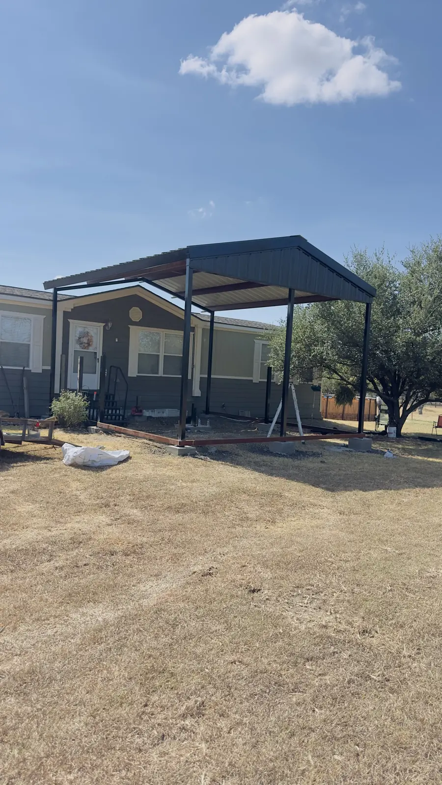 Steel patio cover by Aesthetic Gates & Fence in Navarro County, Texas